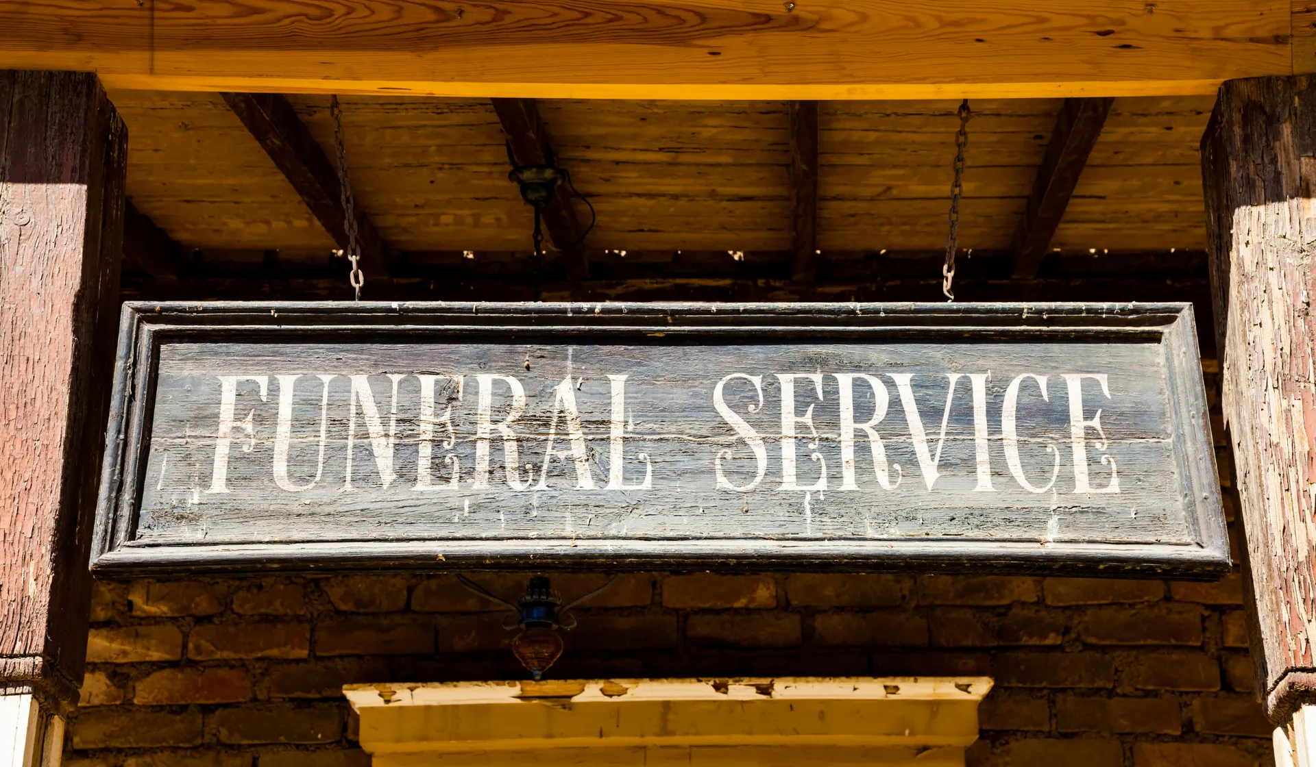 LeadGulls certified PPC specialists reviewing funeral home Google Ads campaign structure and Facebook pre-planning ad performance in a strategy meeting